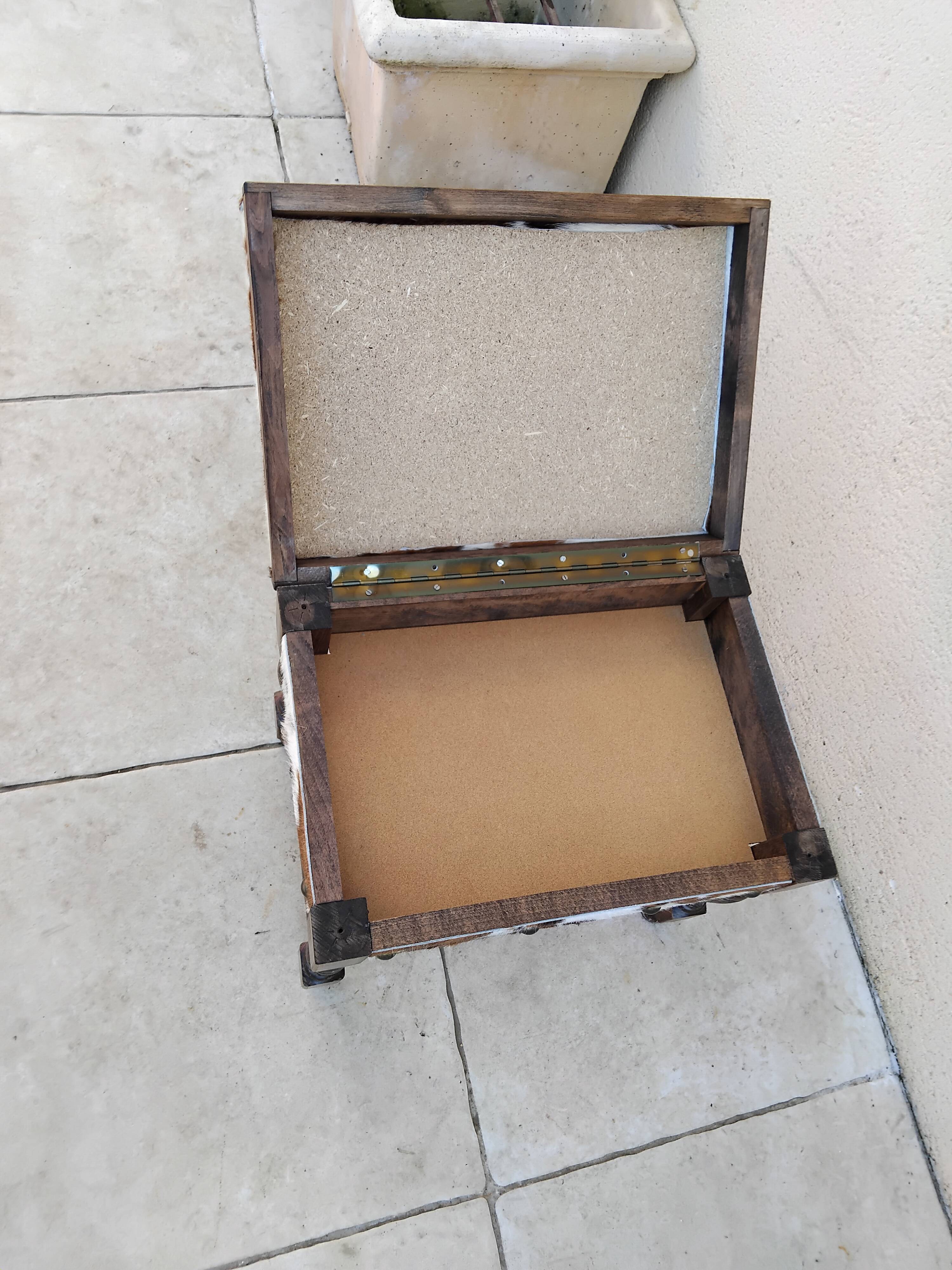 Vintage cowhide trunk stool