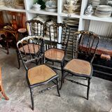 Napoleon III chair in black and gold wood with caning.