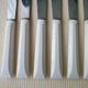 Set of 6 vintage Pradel 255 stainless steel and white bakelite table knives