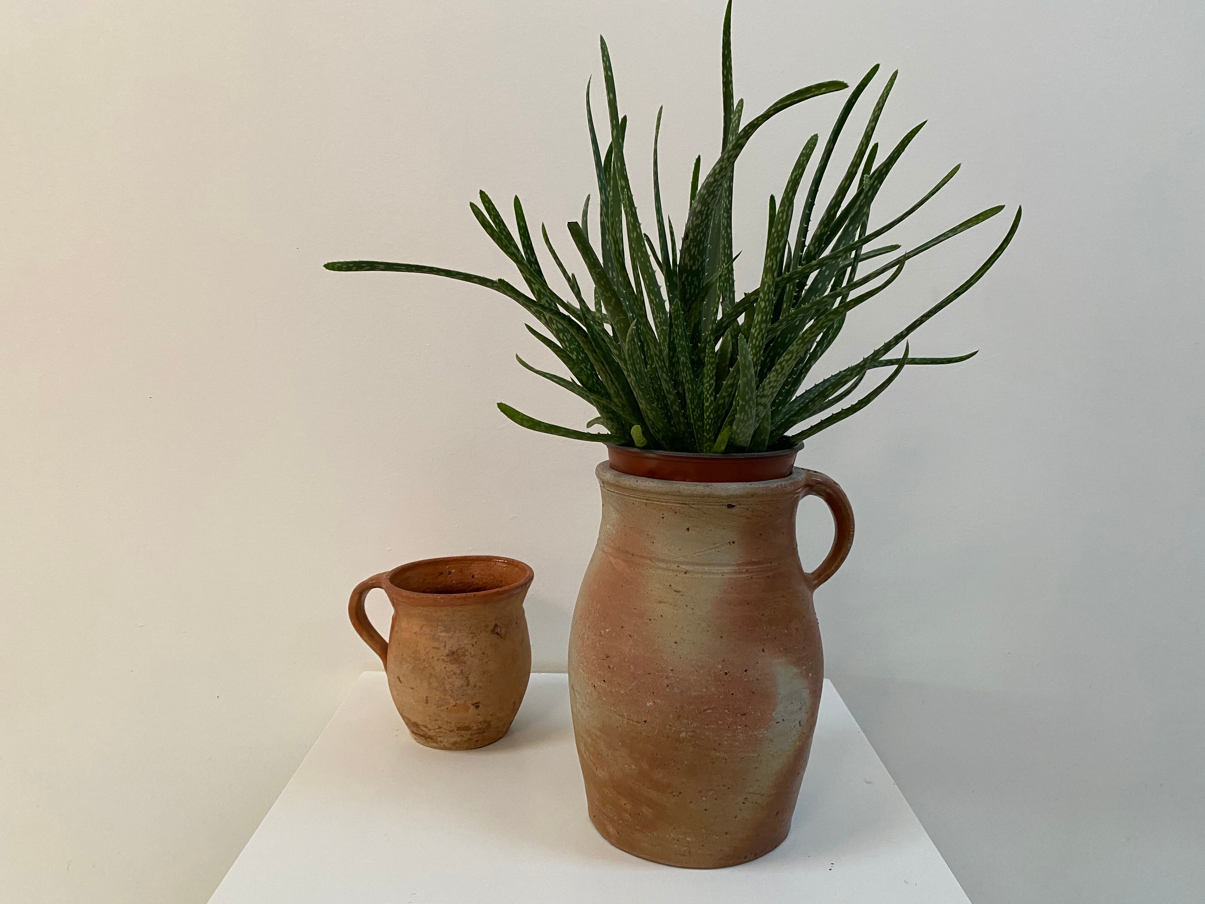 Old sandstone pitcher pot