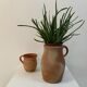 Old sandstone pitcher pot