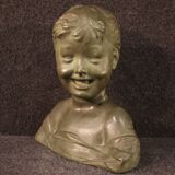 Sculpture in bronze painted terracotta bust of a child
