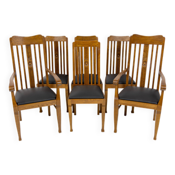 Set of 6 Art Nouveau chairs and armchairs in oak and leather.
