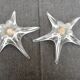 DAUM France pair of crystal candlesticks "Starfish" large model, 1960/1970