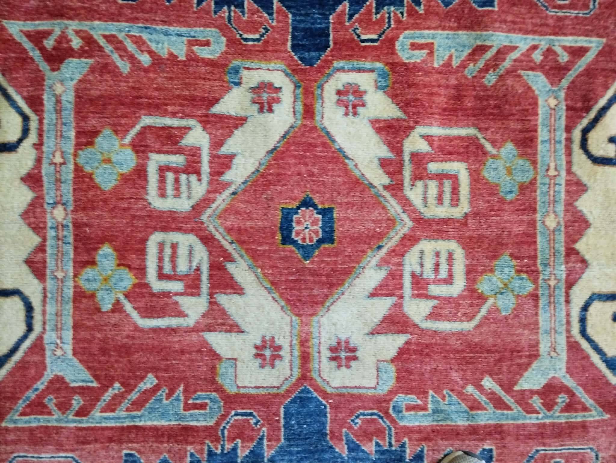 Handmade Pakistani Kazak rug 303x225cm