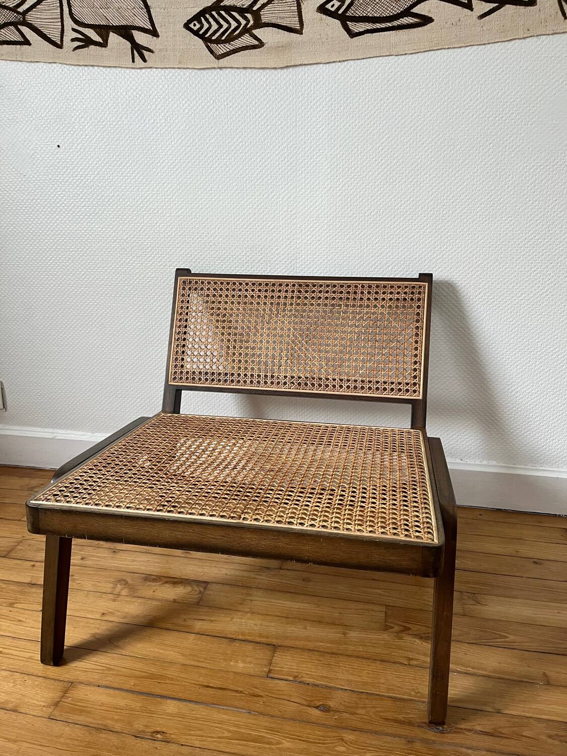 Vintage wooden and cane armchair