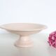 Plat piédouche en céramique rose, 1950