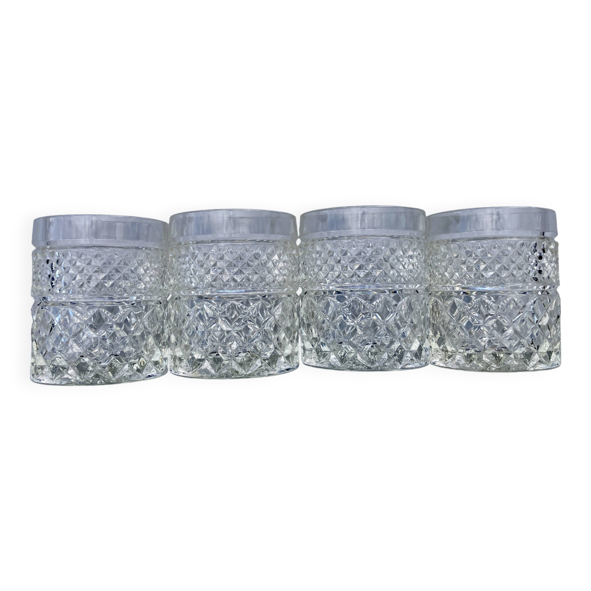 Set of 4 vintage glasses from the 60s-70s in moulded glass.