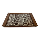 Old wooden tray with psychedelic art deco patterns