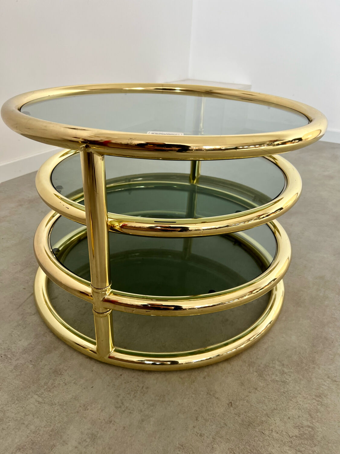 Three-level swivel coffee table in morex design brass Milo Baughman italy