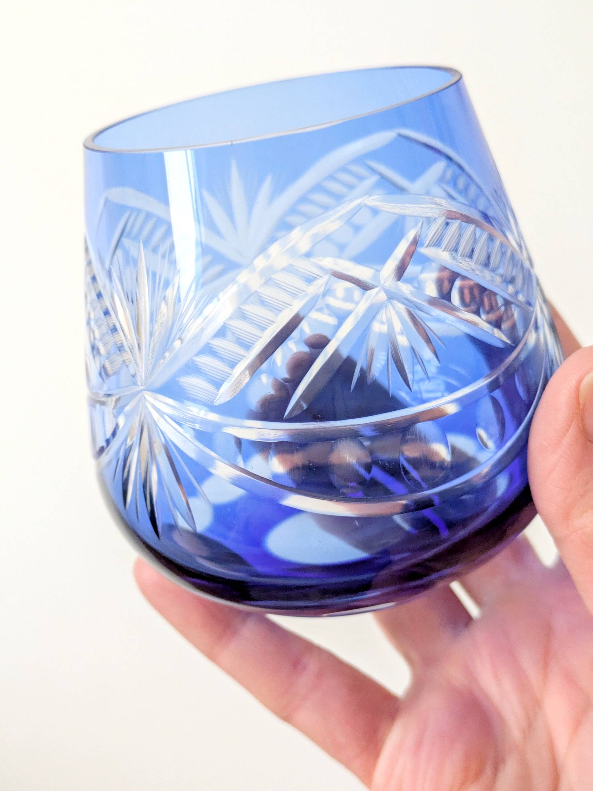 Set of 4 vintage cobalt blue cut glass Römer-style glasses.