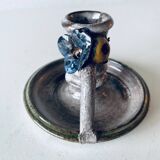 Ceramic candle holder with flower decor