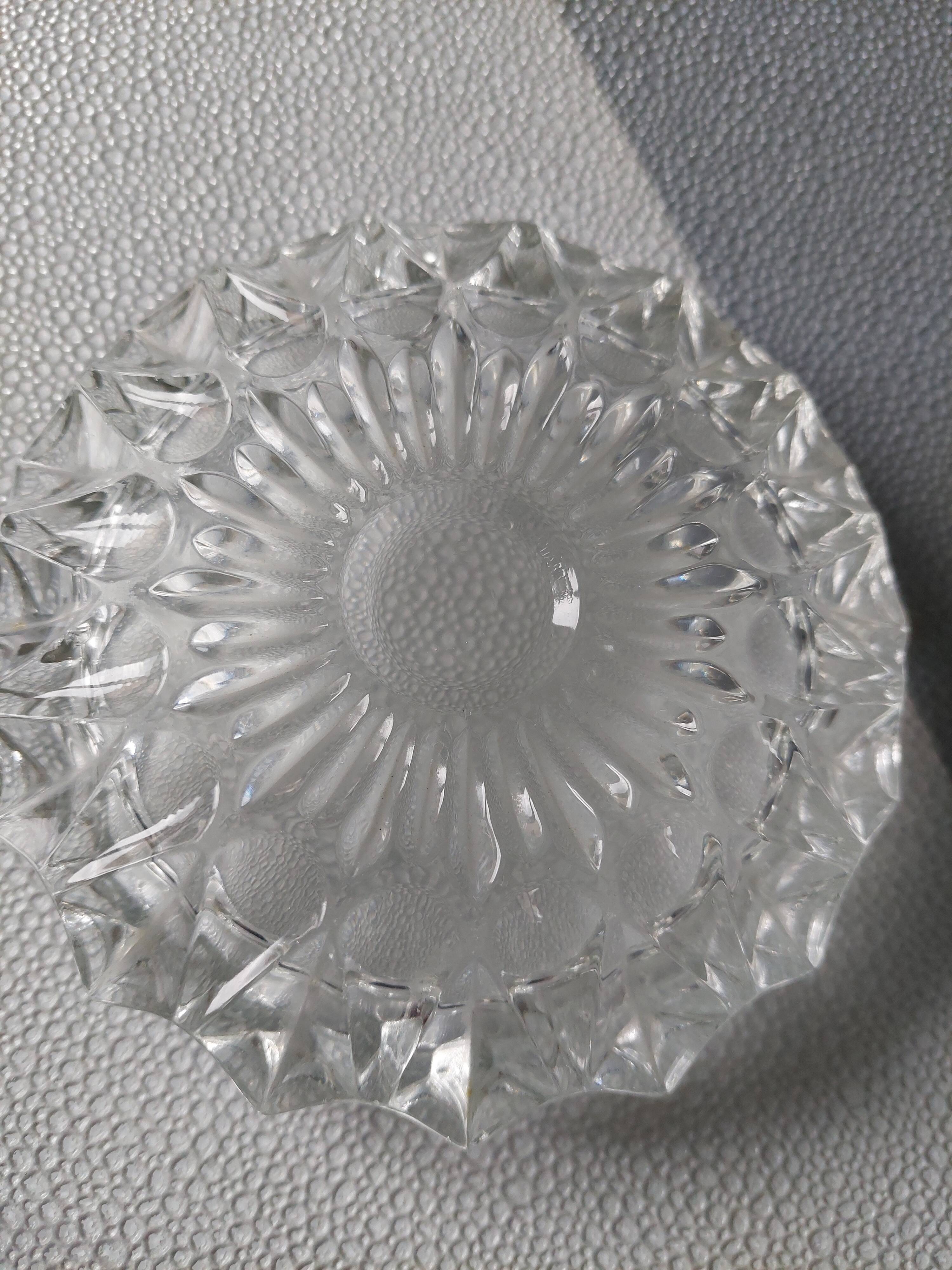 Empty ashtray molded glass pocket