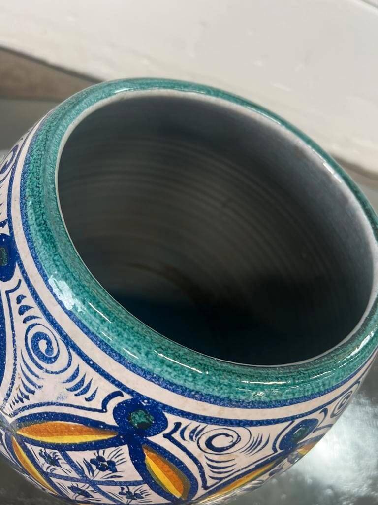 Vintage ceramic vase in ethnic style