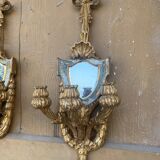 Pair of carved wood sconces