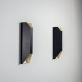 Architectural pair of vintage black metal wall lamps with angular geometric