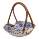 Beautiful small painted ceramic basket with woven handle