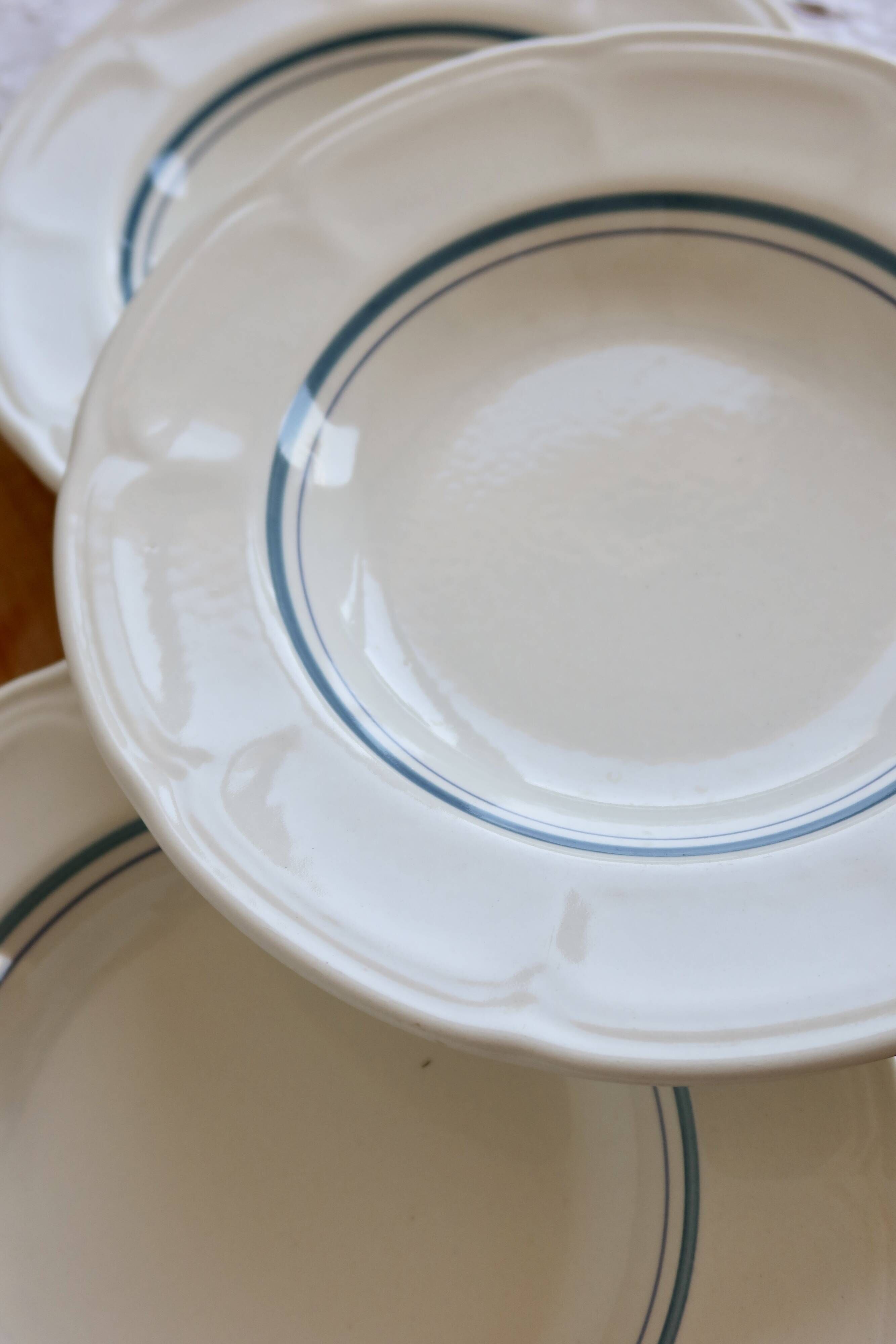 4 vintage ivory earthenware deep plates – double blue borders