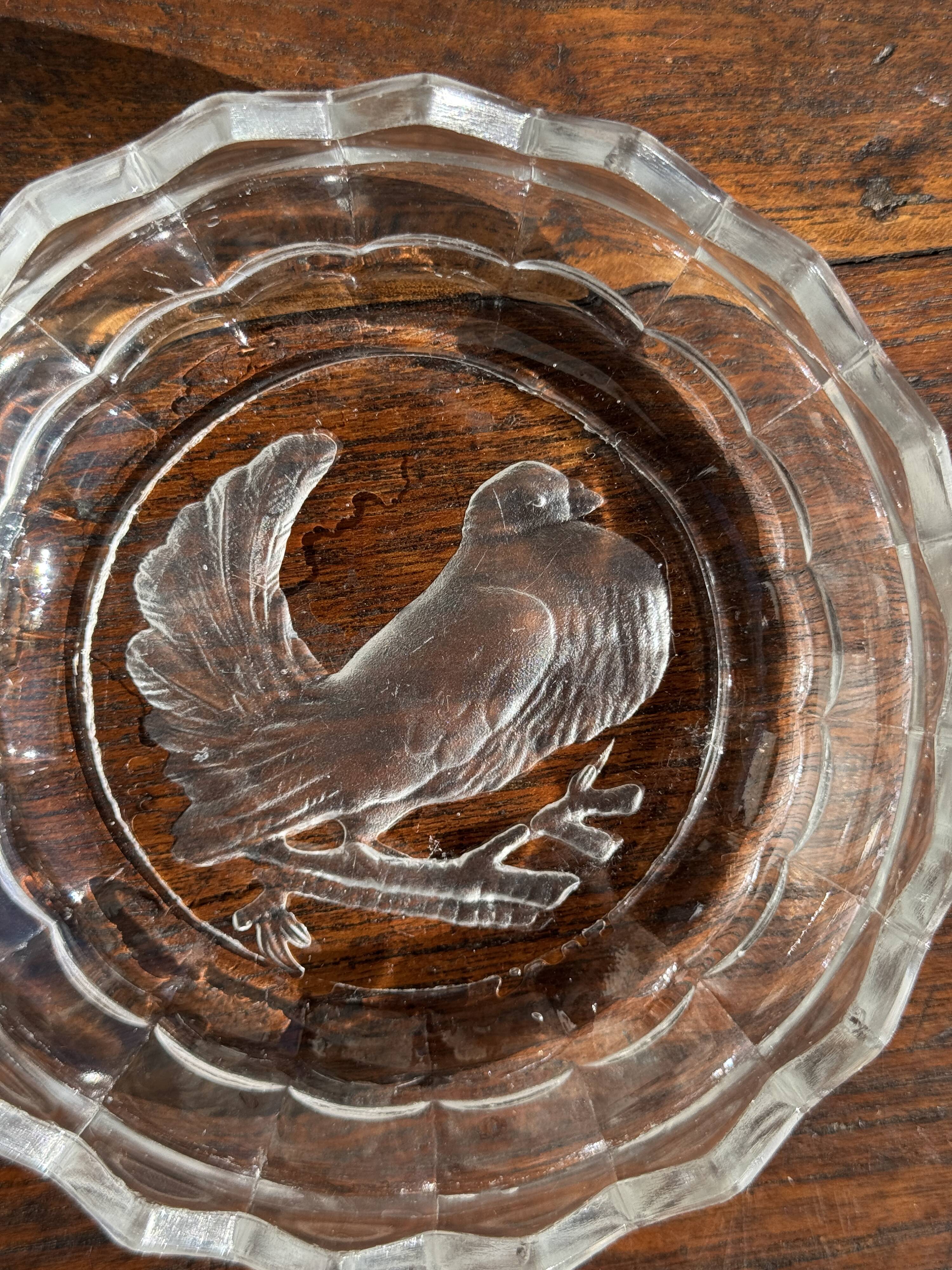 Pressed glass ashtray with dove pattern D:13.5