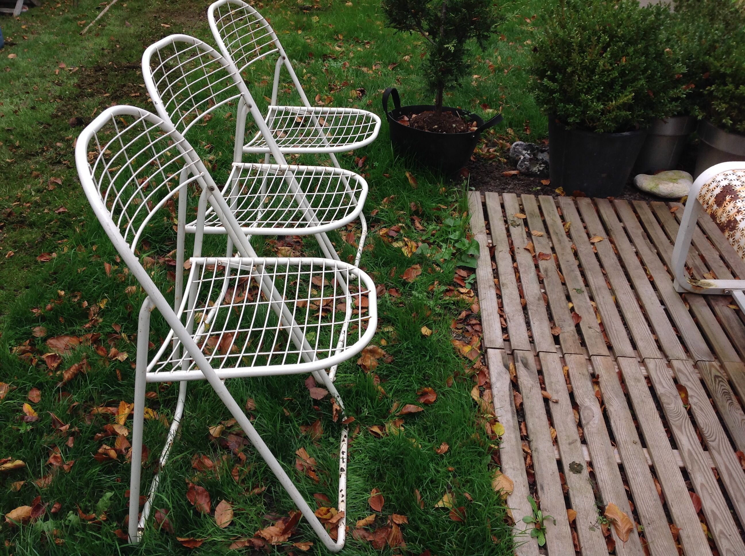 Trio of folding metal chairs