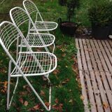 Trio of folding metal chairs