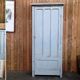 Wall cabinet has a door on coaching