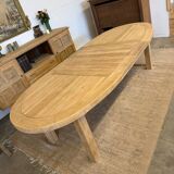 Oval farmhouse table in solid oak with extensions.