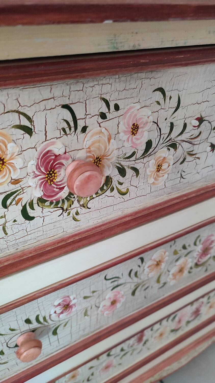 Painted chest of drawers with floral decoration