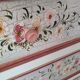 Painted chest of drawers with floral decoration