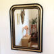 Miroir Louis-Philippe noir et doré - 73 X 52 cm
