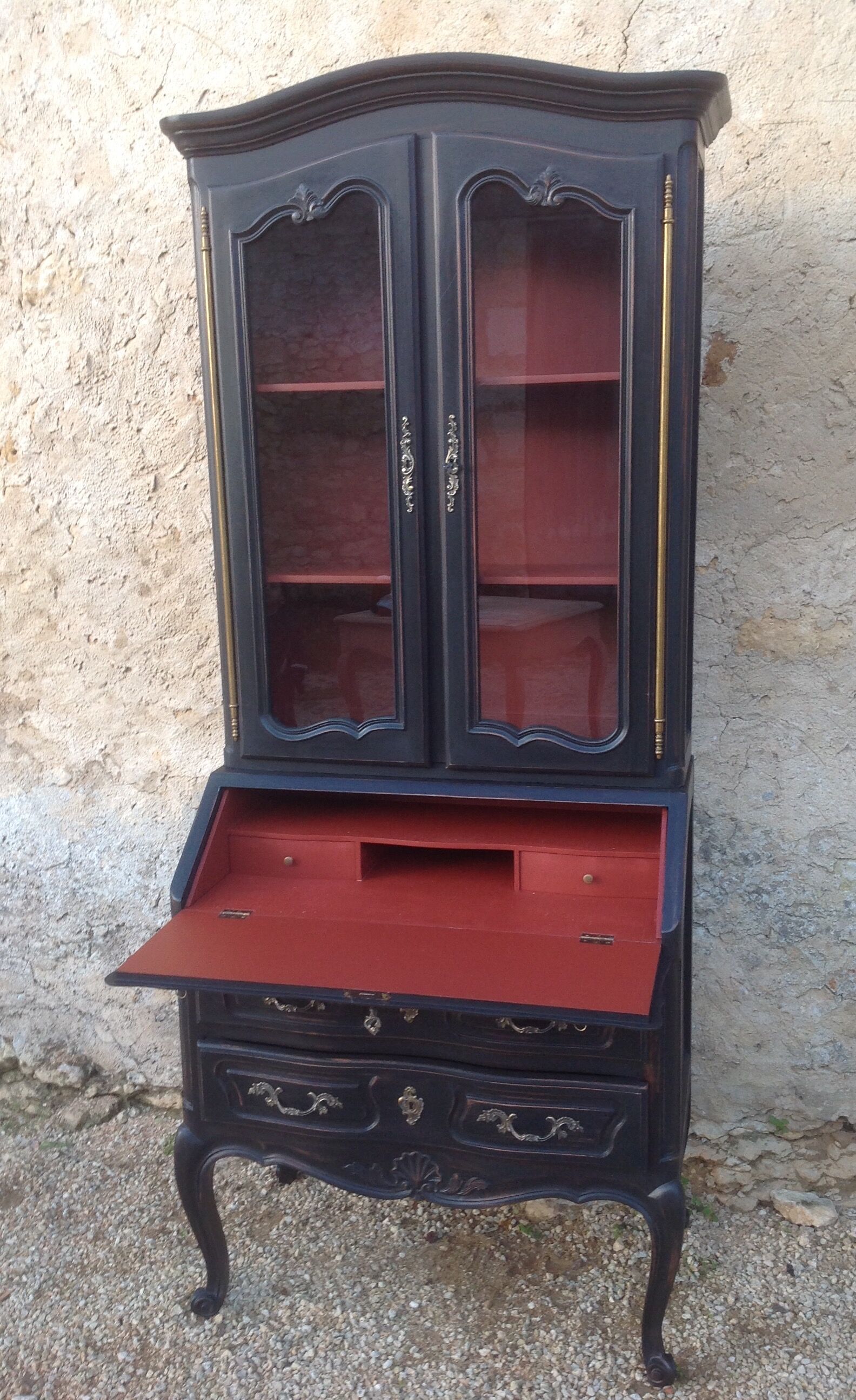 Louis XV style scriban bookcase in black and Basque red patinated cherry wood