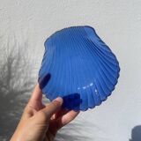 Blue glass shell emptier