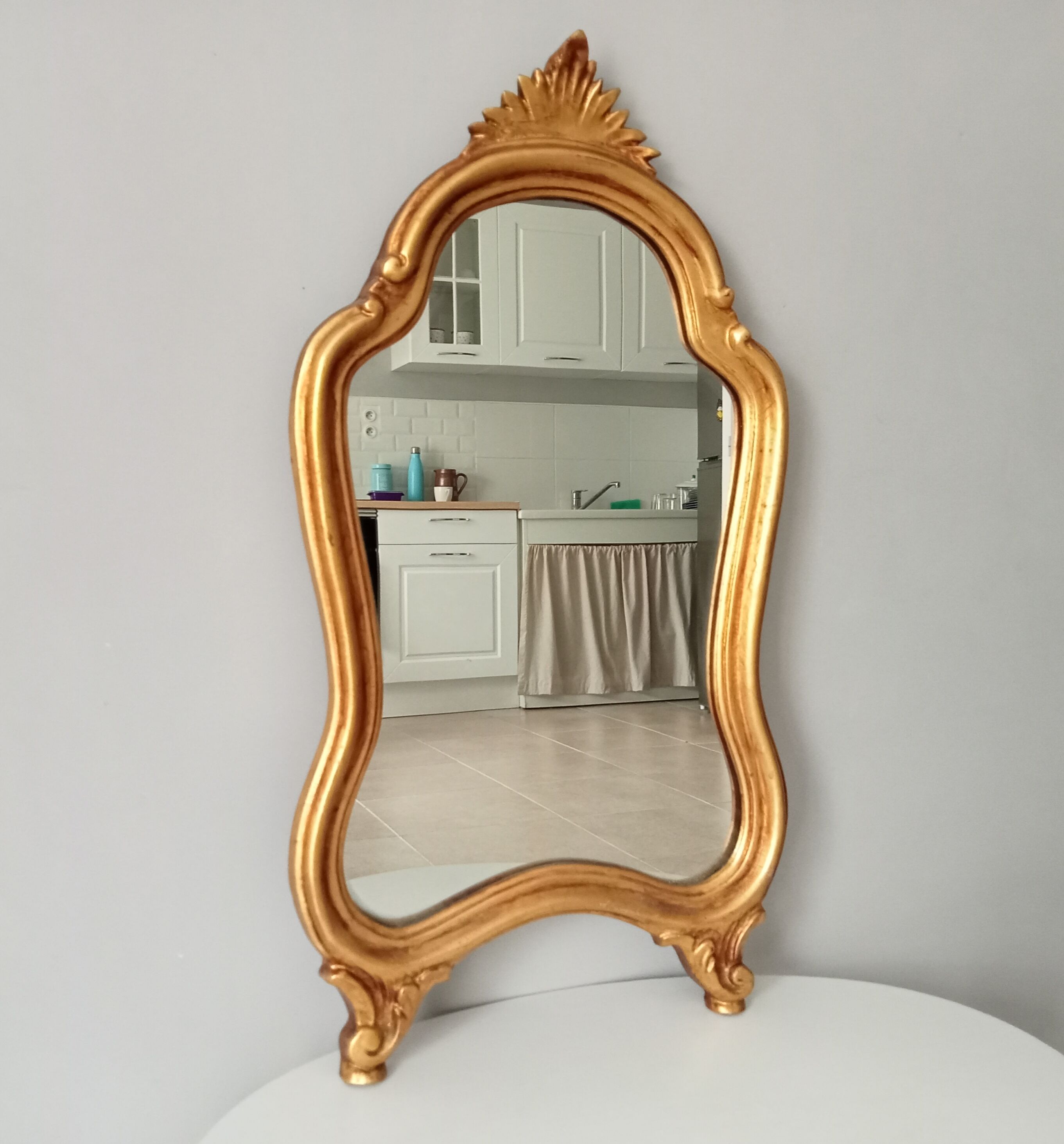 Vintage rocaille mirror in gilded wood