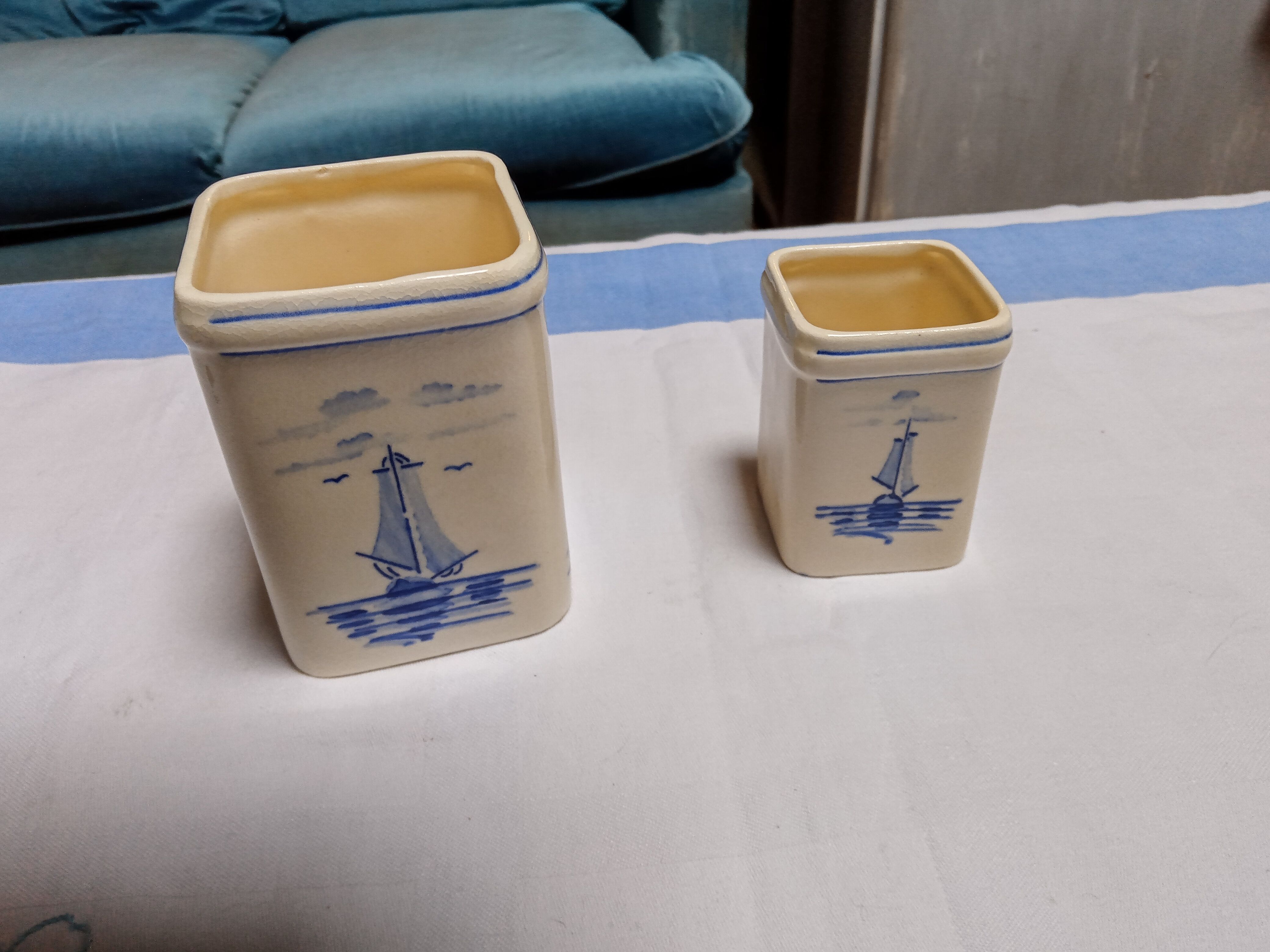 2 old spice pots
