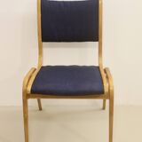 Set of 4 Scandinavian design curved wood chairs from the 60s.