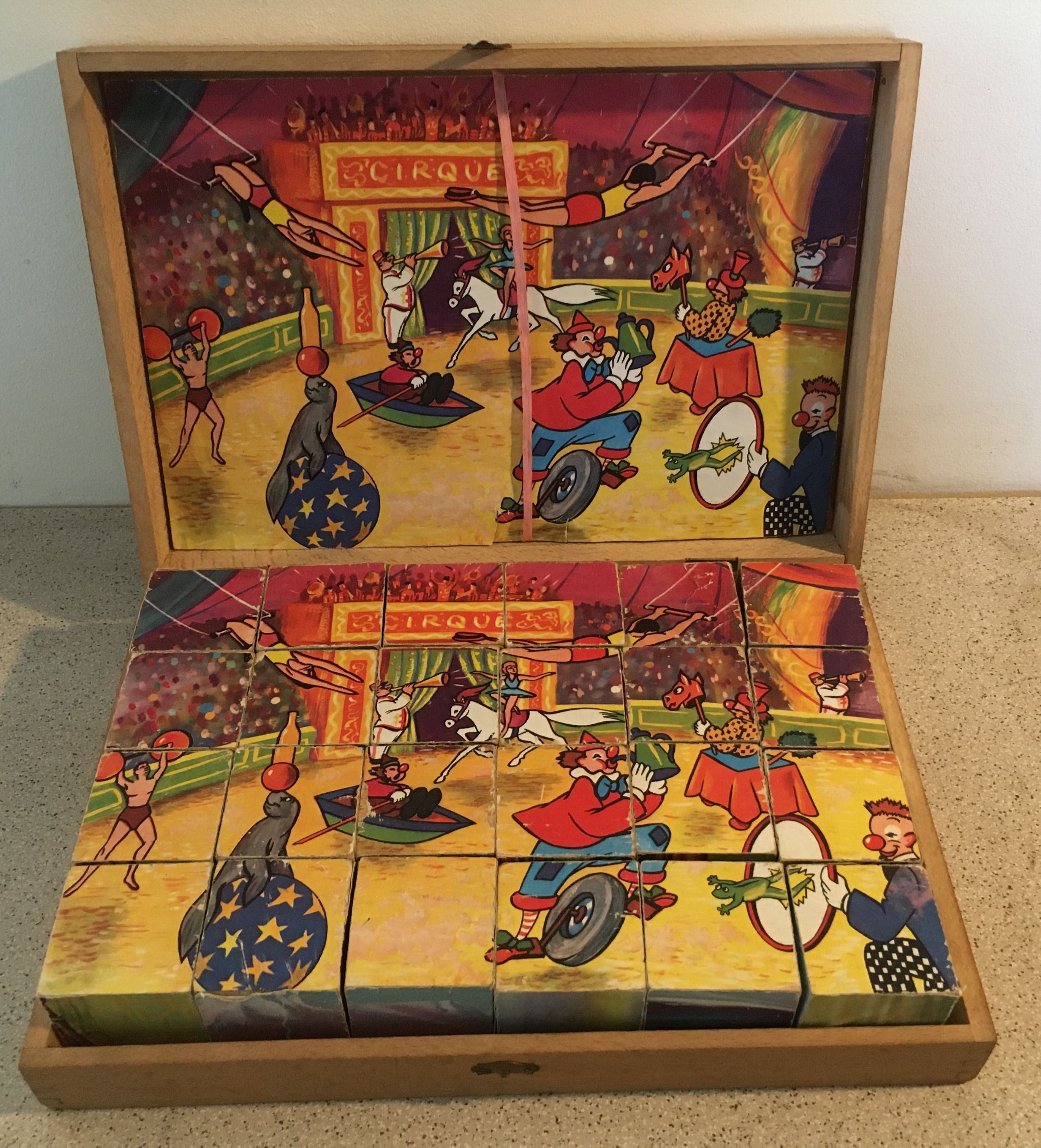 Old game of 24 wooden puzzle cubes from the 1950s