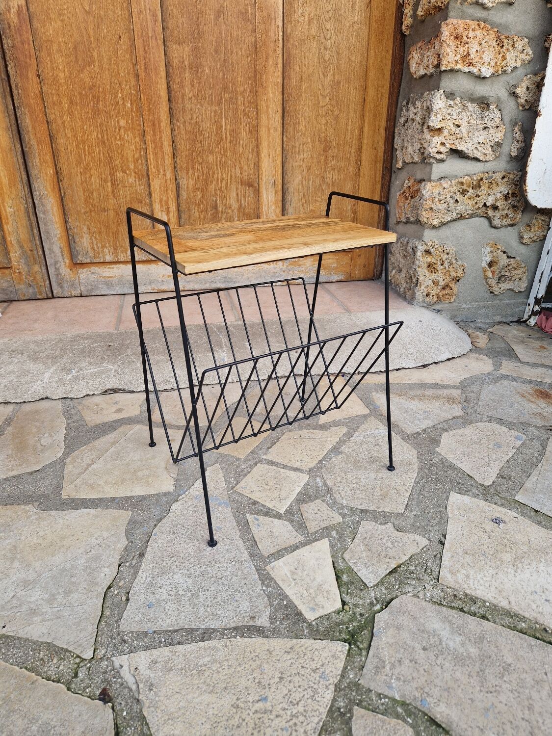 Bedside table with magazine holder