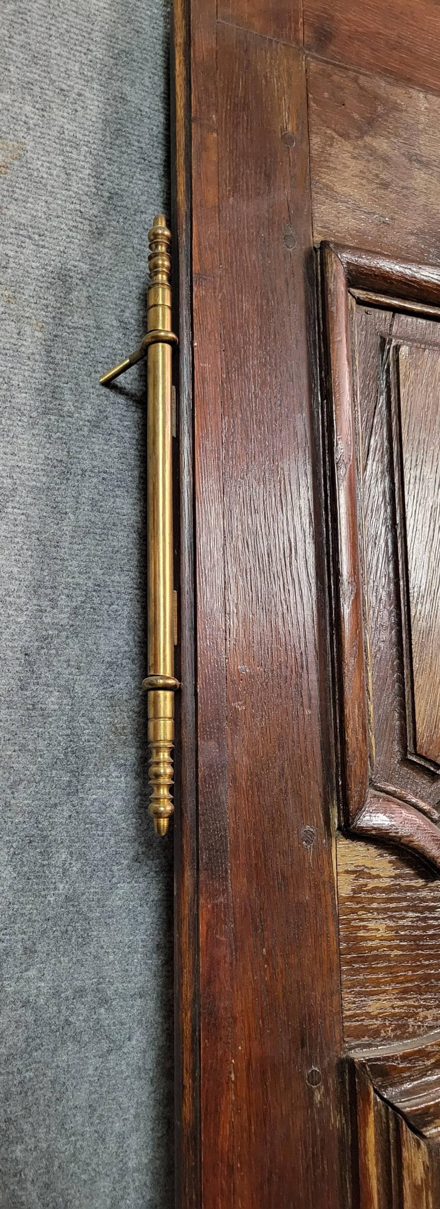 Pair of 18th century oak woodwork castle doors with putti