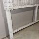Vintage headboard in woven white rattan