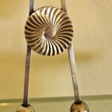 Ice cube or sugar tongs in silver metal