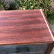 Vintage Scandinavian secretary in rosewood with drawers featuring fin-style handles.