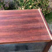 Vintage Scandinavian secretary in rosewood with drawers featuring fin-style handles.