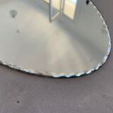 Old beveled oval mirror