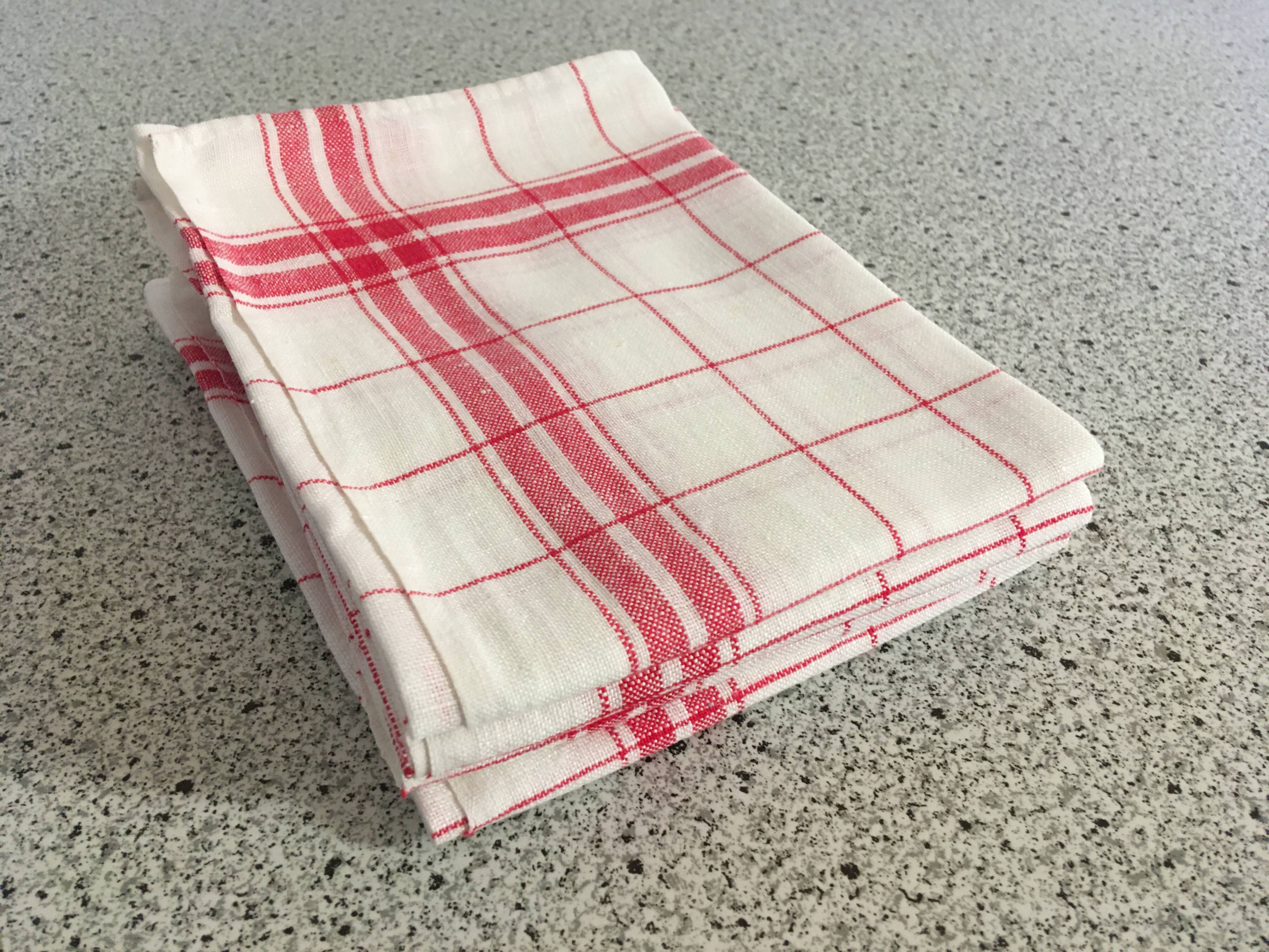 4 red mixed-race tea towels