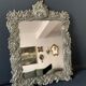Antique Italian mirror in repoussé silver metal
