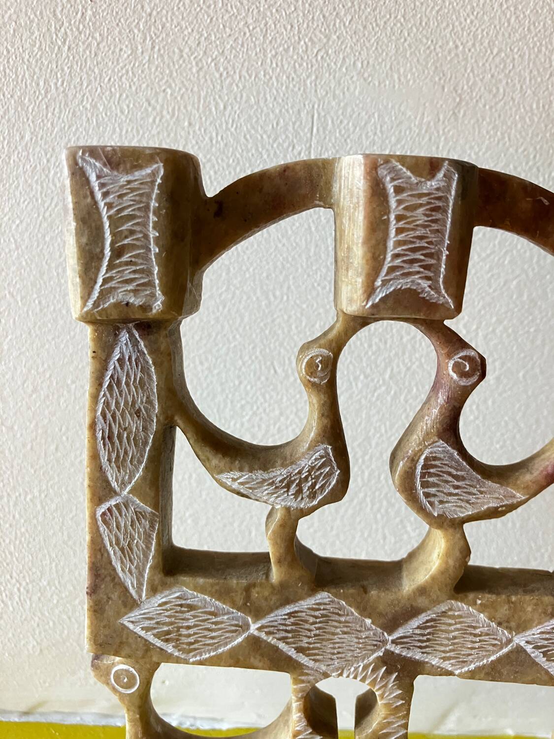 Vintage stone folk art candle holder