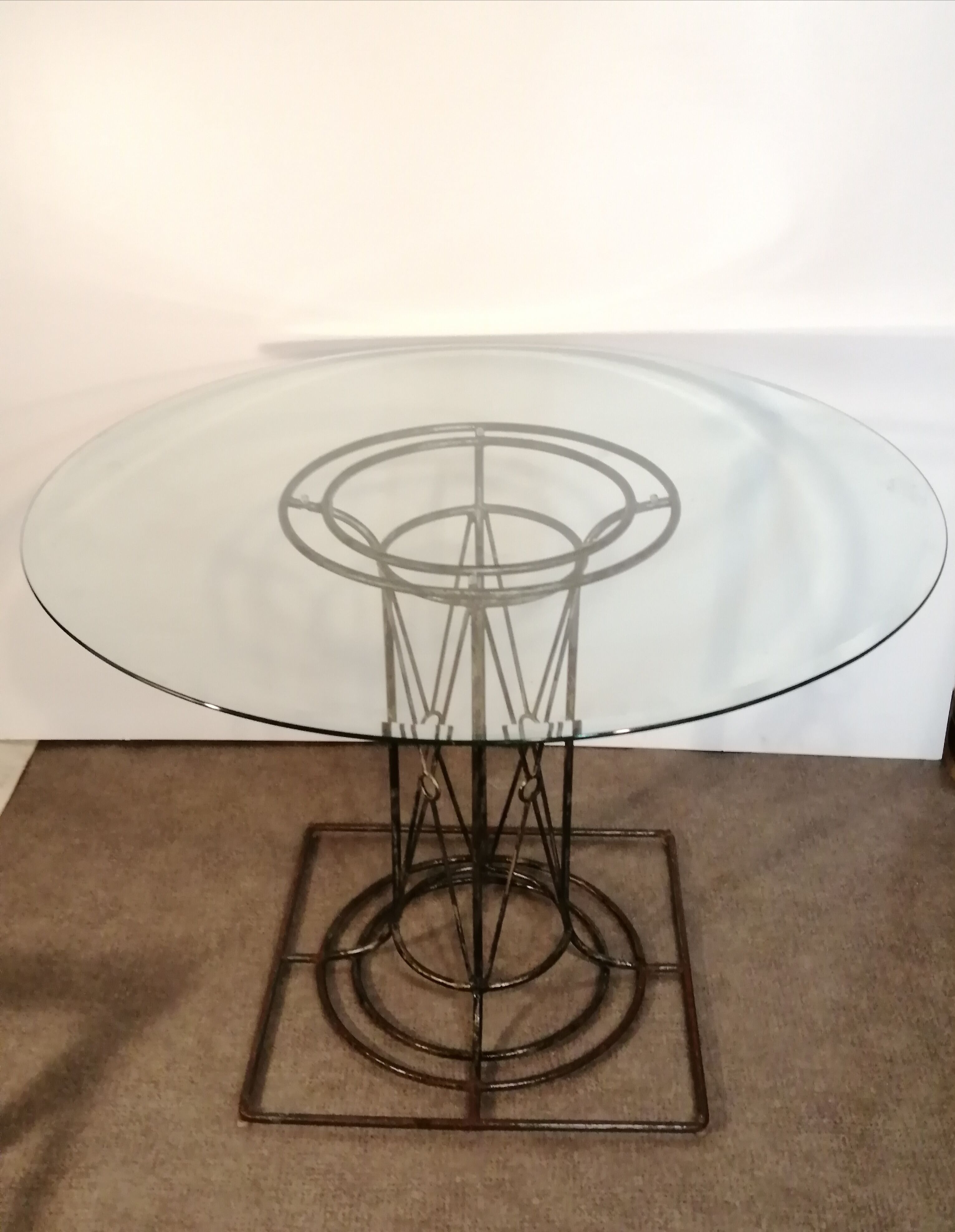 Wrought iron dining table with beveled round glass top, vintage 1980