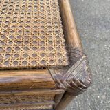 Pair of vintage bedside tables in rattan and caned wicker.