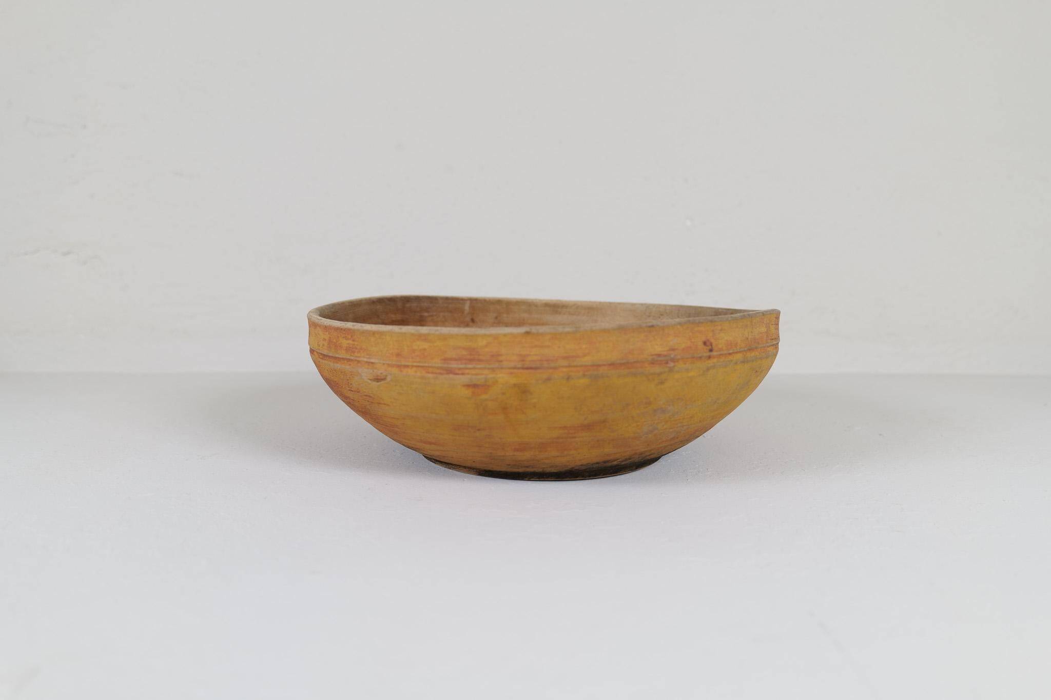 Set of three unique farmhouse bowls from 19th-century Swedish folk art.