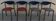 4 Gondola-style chairs with a sturdy metal frame and faux leather for